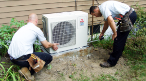 Total Comfort Mechanical's Heating and Air Conditioning specialists at work in Burlington, MA